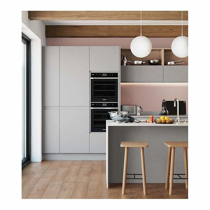 a kitchen with a stove and a refrigerator  (2368150208570)