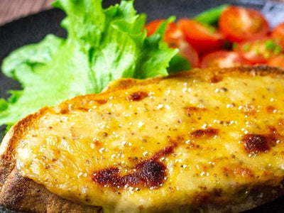 Spicy Welsh rarebit with chilli and three cheeses.