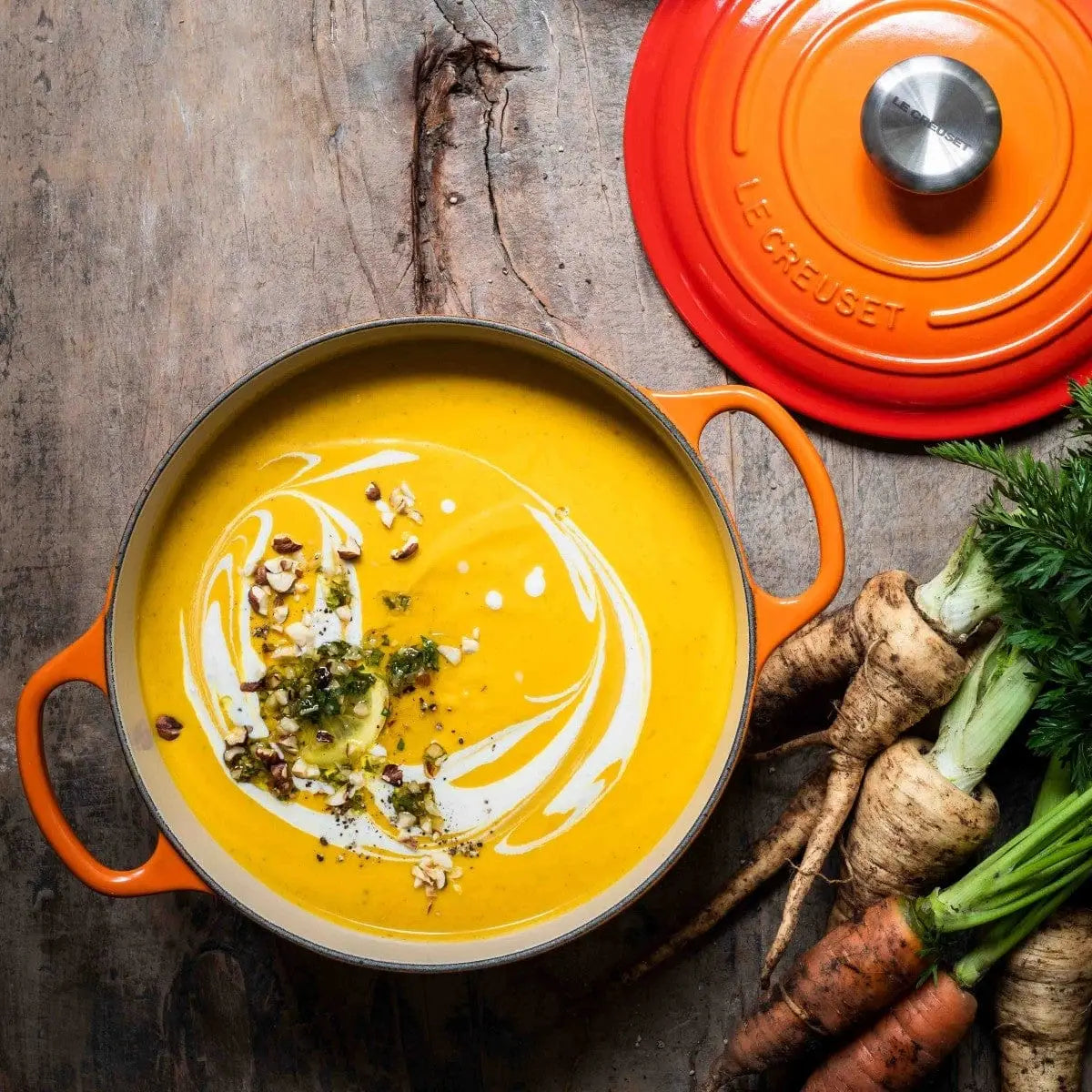 Topped with crunchy hazelnut salsa, this Roast Carrot and Parsnip Soup is wholesome and tasty.