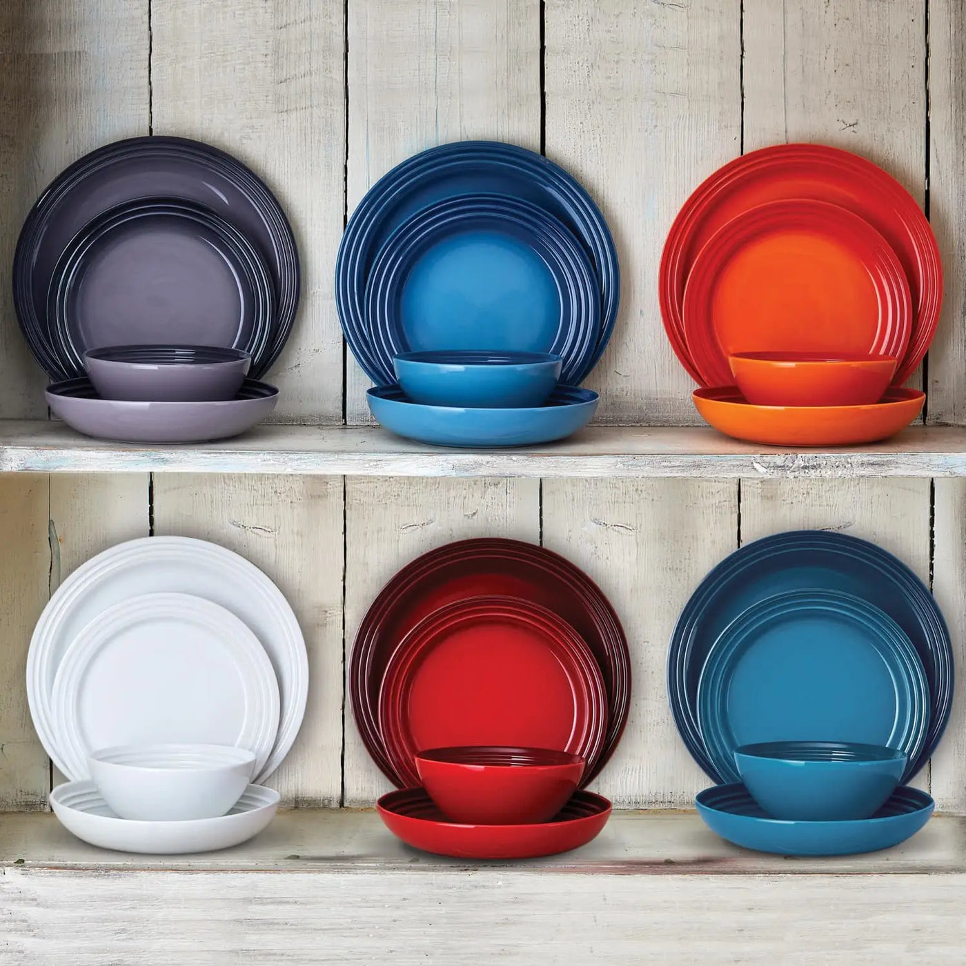 Le Creuset Stoneware Plates in Volcanic, Cerise, Teal, Flint and white