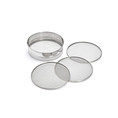 Set of metal sieves on a white background