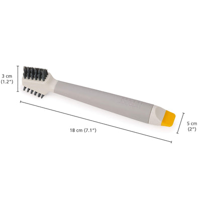 Grit brush with measurements on a white background