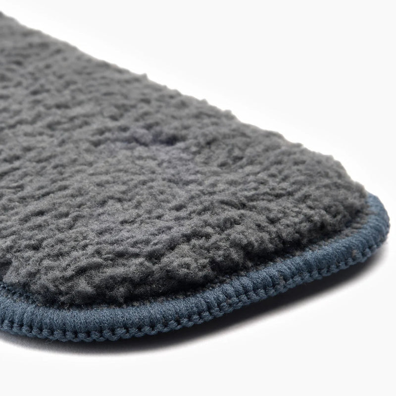 Gray textured cloth with blue border on a white background