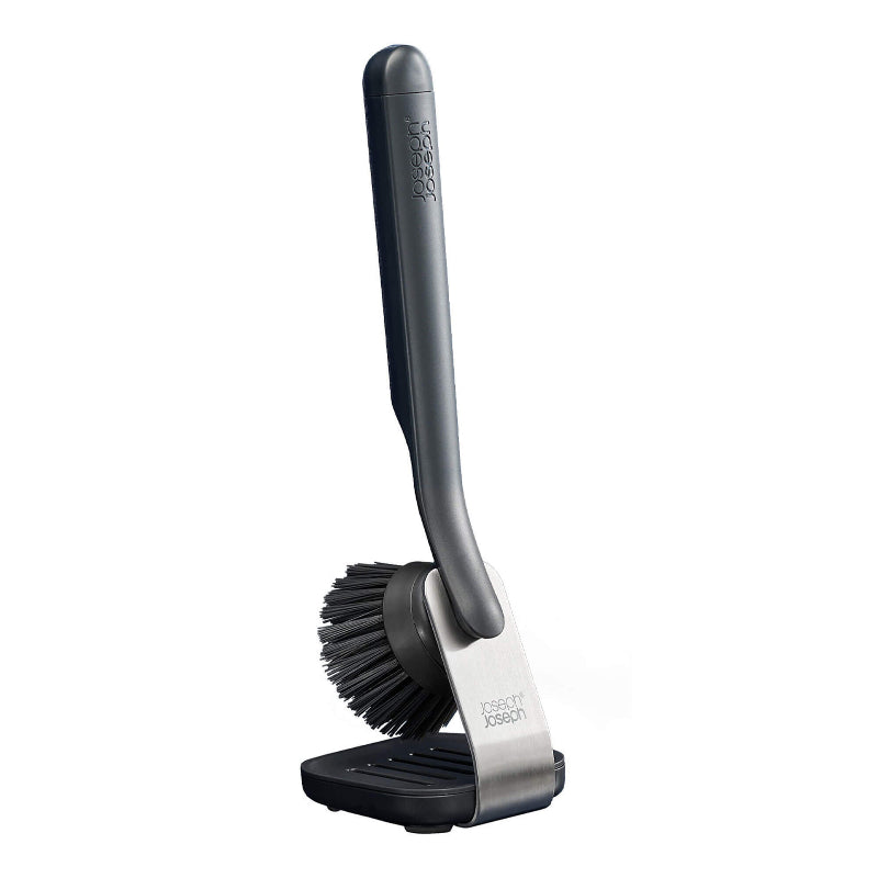 Gray kitchen brush with black bristles on a white background