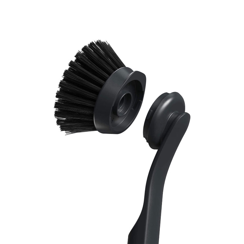 Black brush with a handle on a white background