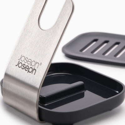 Metallic kitchen tool with black component on a white background, featuring 'Joseph Joseph' branding.
