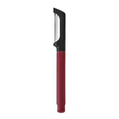 Peeler with red handle and black metal blade on a white background