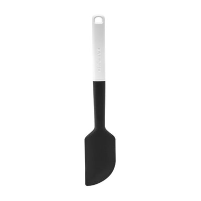 Black spatula with a white handle on a white background