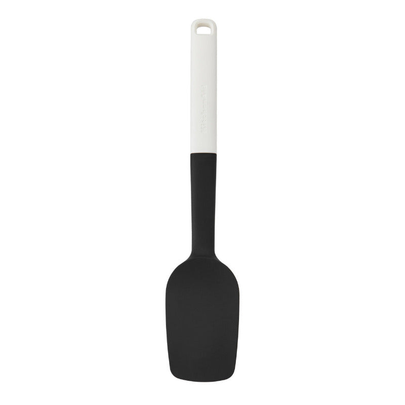 Black spatula with a white handle on a white background
