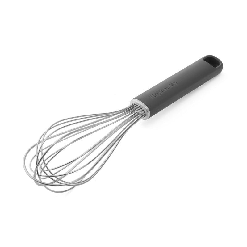 Black-handled whisk on a white background