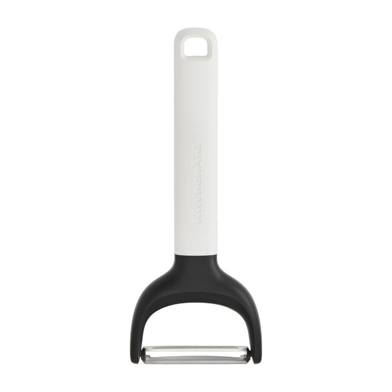 Y-shaped peeler with a white handle and black base on a white background
