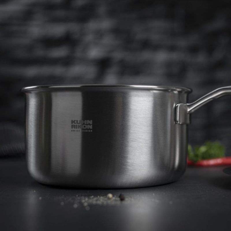 Stainless steel pot with a blurred background