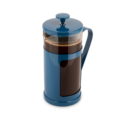 Blue French press with coffee on a white background