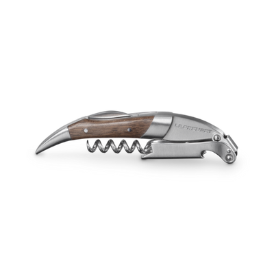 Corkscrew with wooden handle on a white background