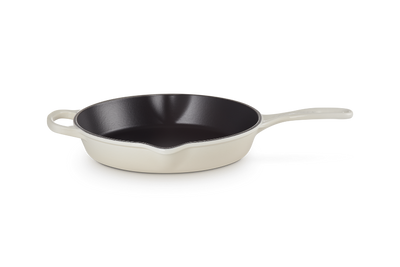Skillet with a metallic handle on a white background