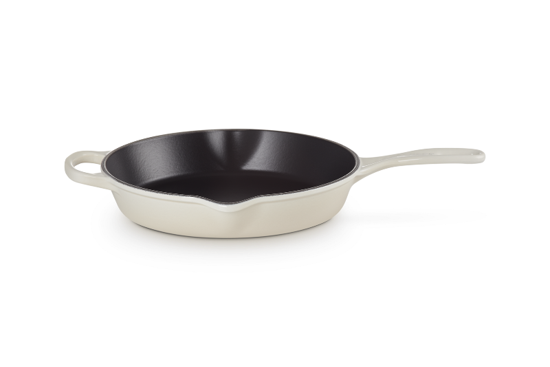 Skillet with a metallic handle on a white background