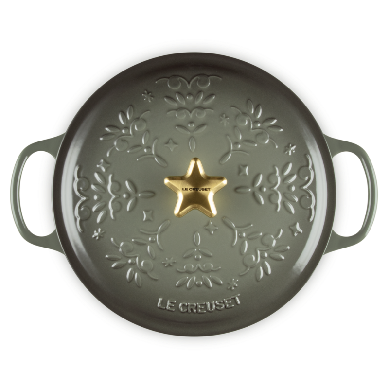 Green cast iron skillet with star design and &