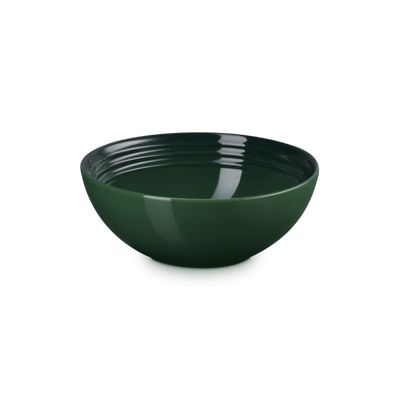 Green ceramic bowl on a white background