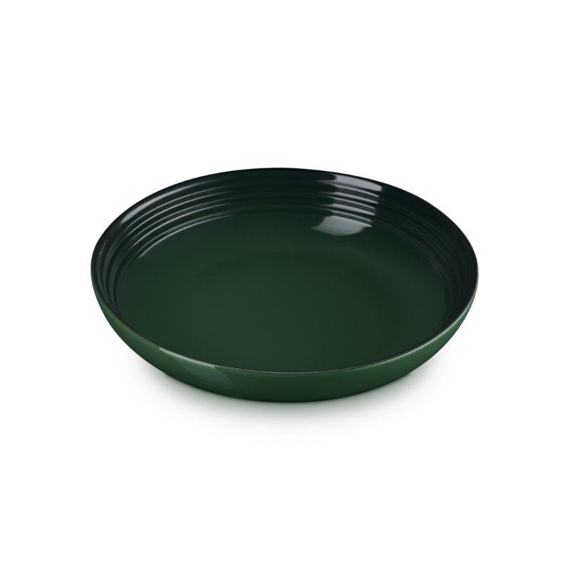 Green ceramic plate on a white background