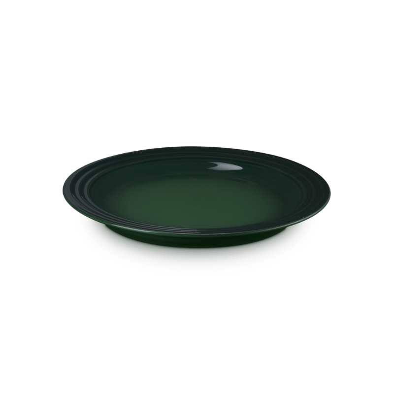 Green ceramic plate on a white background