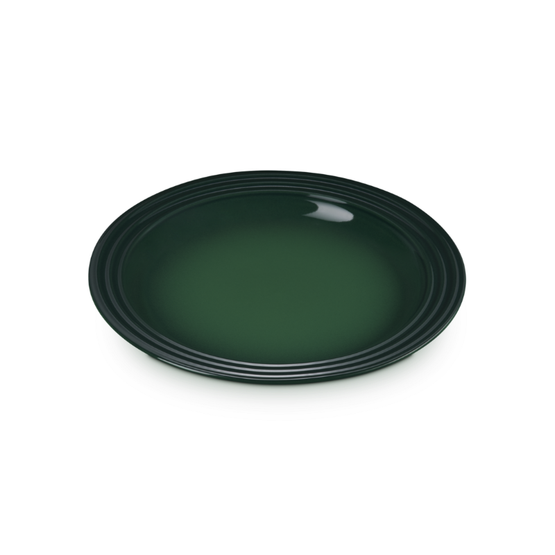 Green ceramic plate on a white background