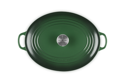 Green oven dish with handles on a white background