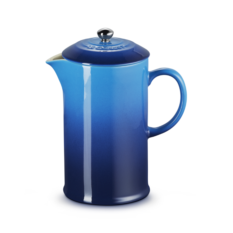 Blue French press coffee maker on a white background