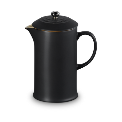 Black coffee press on a white background