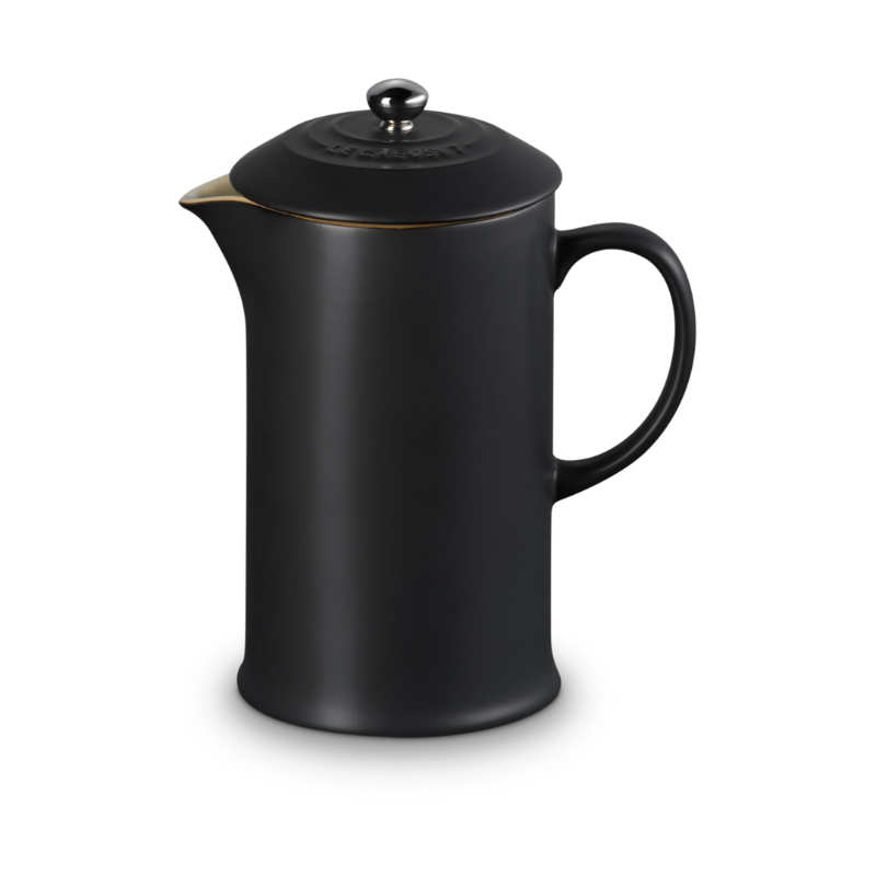 Black coffee press on a white background
