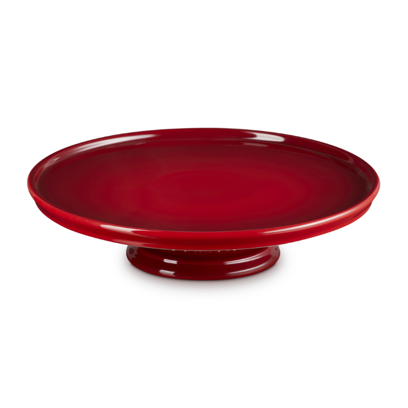 Red cake stand on a white background