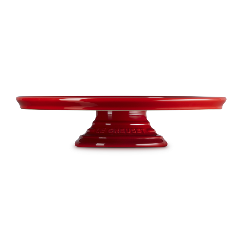 Red cake stand on a white background