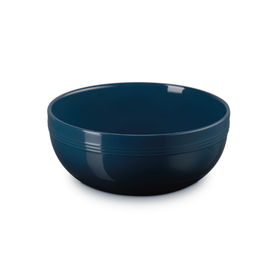 Blue ceramic bowl on a white background