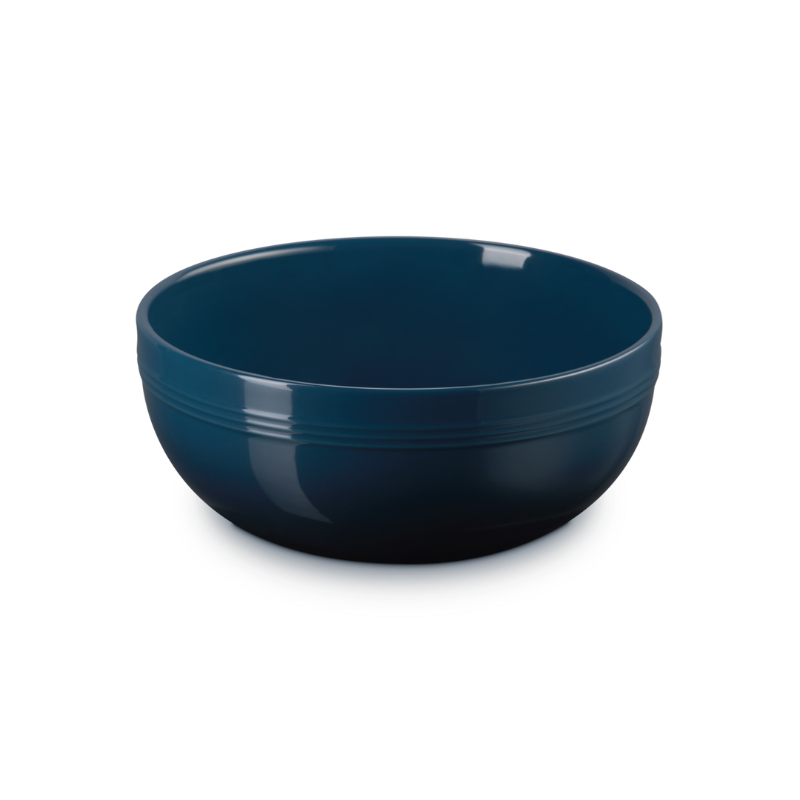 Blue ceramic bowl on a white background