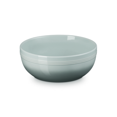 Light blue ceramic bowl on a white background