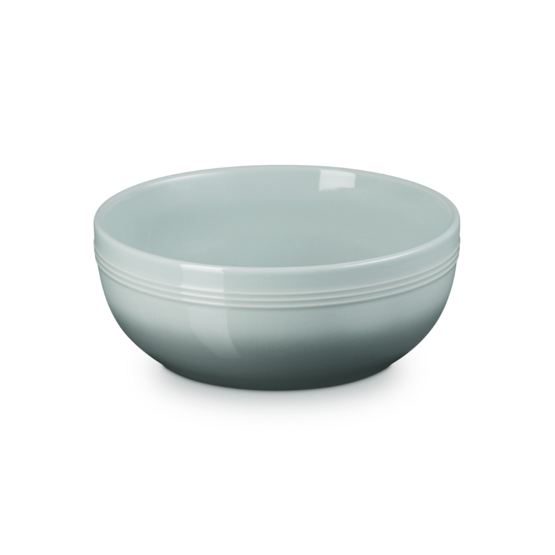 Light blue ceramic bowl on a white background