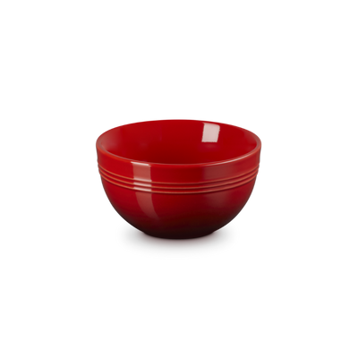 Red ceramic bowl on a white background