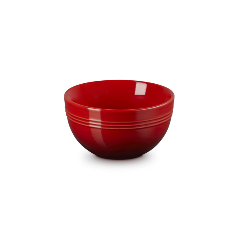 Red ceramic bowl on a white background