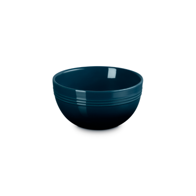 Blue ceramic bowl on a white background