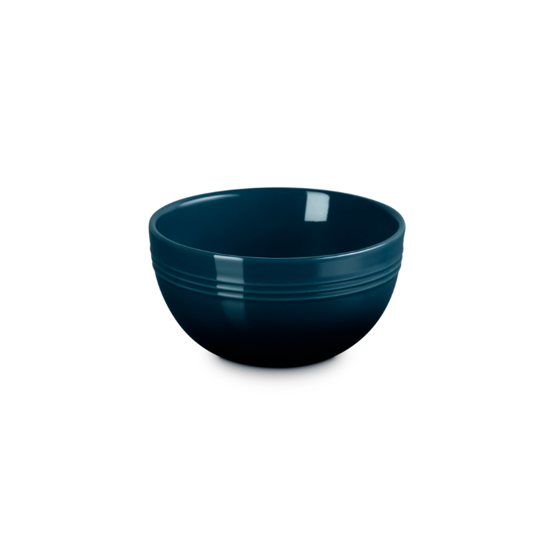 Blue ceramic bowl on a white background