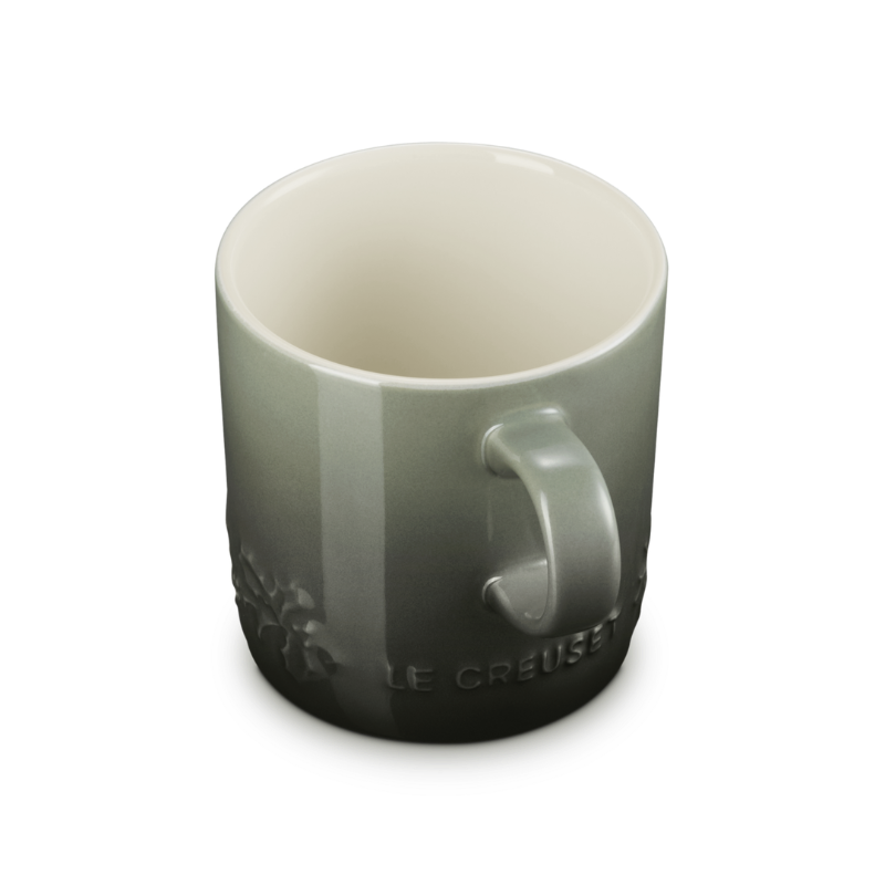 Gray mug with handle on a white background