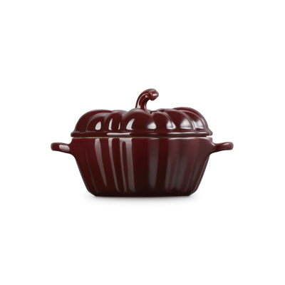 Brown ceramic pumpkin-shaped pot on a white background