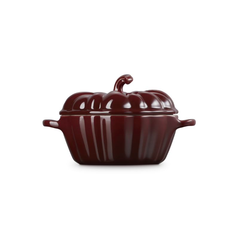 Brown ceramic pumpkin-shaped pot on a white background