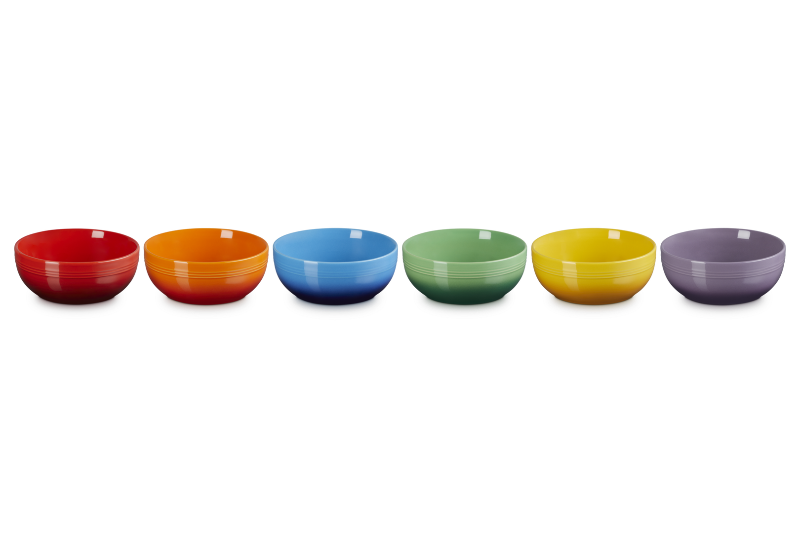Set of six colorful bowls on a white background