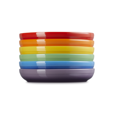 Stack of colorful bowls on a white background