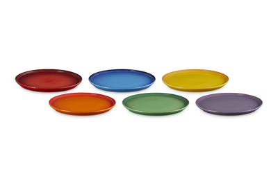 Set of six colorful plates on a white background