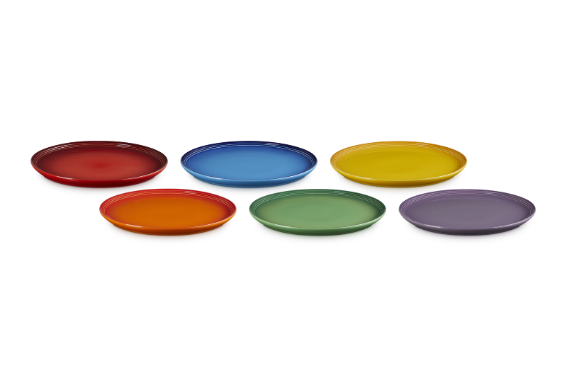 Set of six colorful plates on a white background