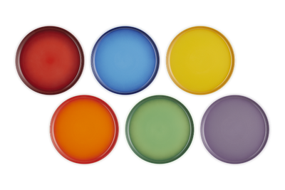 Set of six colorful circular objects on a white background