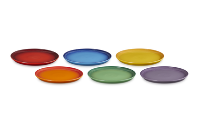 Set of six colorful plates on a white background