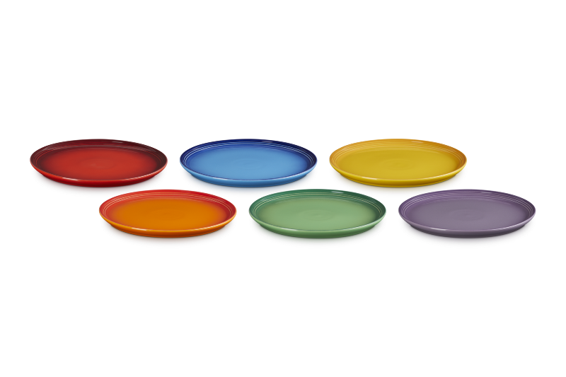 Set of six colorful plates on a white background