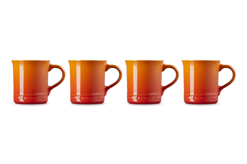 Four orange mugs with a brand logo on a white background